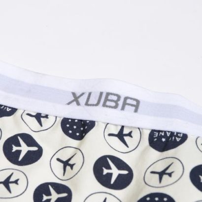 First Class white smoke cotton boxer decorated with planes and stars and contains a grey belt