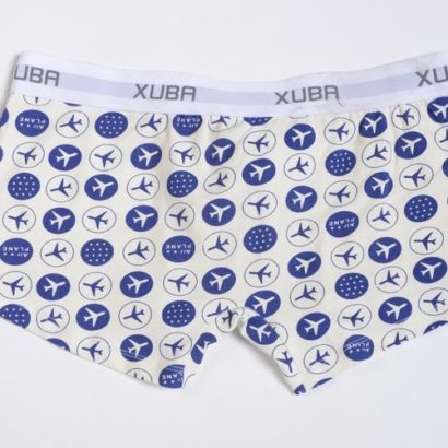 First Class white cotton boxer decorated with blue planes and stars and contains a grey belt