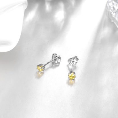 Silver 925 Earring decorated by yellow crystal bezel