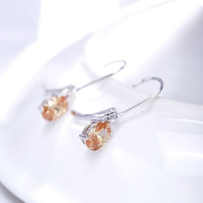 Silver 925 Earring decorated by champagne crystal bezel