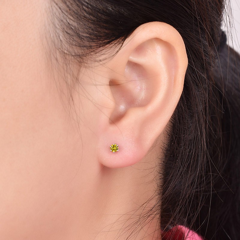 Silver 925 Earring decorated by green crystal bezel