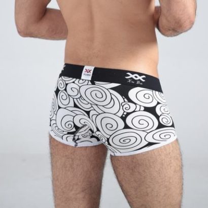 First class black cotton boxer decorated with beige circles and contains black belt