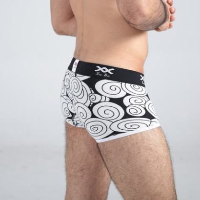 First class black cotton boxer decorated with beige circles and contains black belt