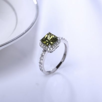 Silver 925 ring inlaid with olive green crystal bezel and side special crystals