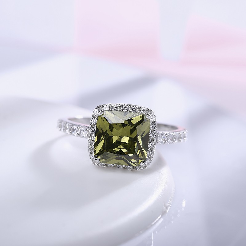 Silver 925 ring inlaid with olive green crystal bezel and side special crystals