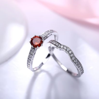 Luxurious silver 925 ring inlaid with red zircon bezel and side white special crystals