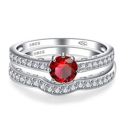 Luxurious silver 925 ring inlaid with red zircon bezel and side white special crystals