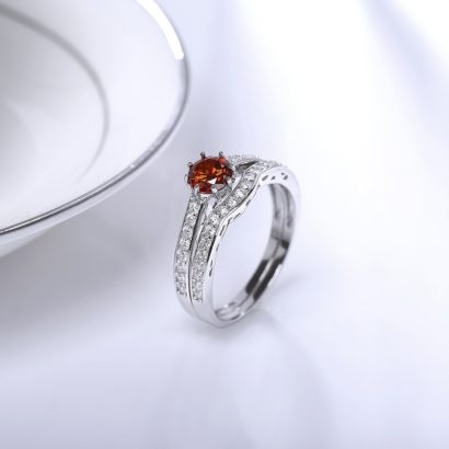 Luxurious silver 925 ring inlaid with red zircon bezel and side white special crystals