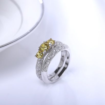 Luxurious silver 925 ring inlaid with three Champagne crystals bezel and side white special crystals