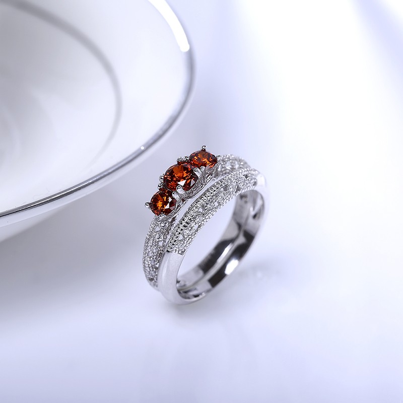 Luxurious silver 925 ring inlaid with three red crystal bezel and side white special crystals