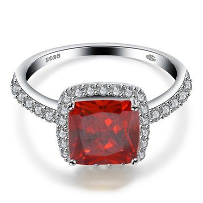 Luxurious silver 925 ring inlaid with red zircon bezel and side white special crystals