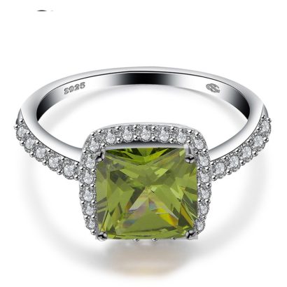Luxurious silver 925 ring inlaid with olive green crystal bezel and side white special crystals