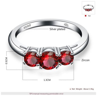 Luxurious silver 925 ring inlaid with three red zircon bezel and side white special crystals