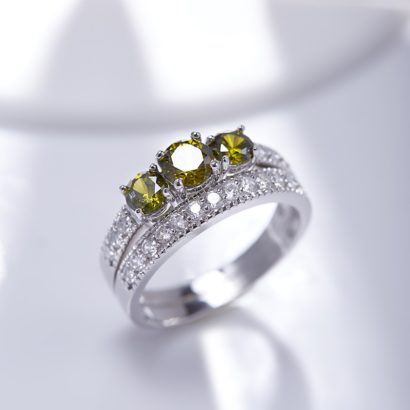 Luxurious silver 925 twins rings inlaid with three olive green zircons and side white special crystals