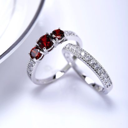 Luxurious silver 925 twins rings inlaid with three red zircons and side white special crystals