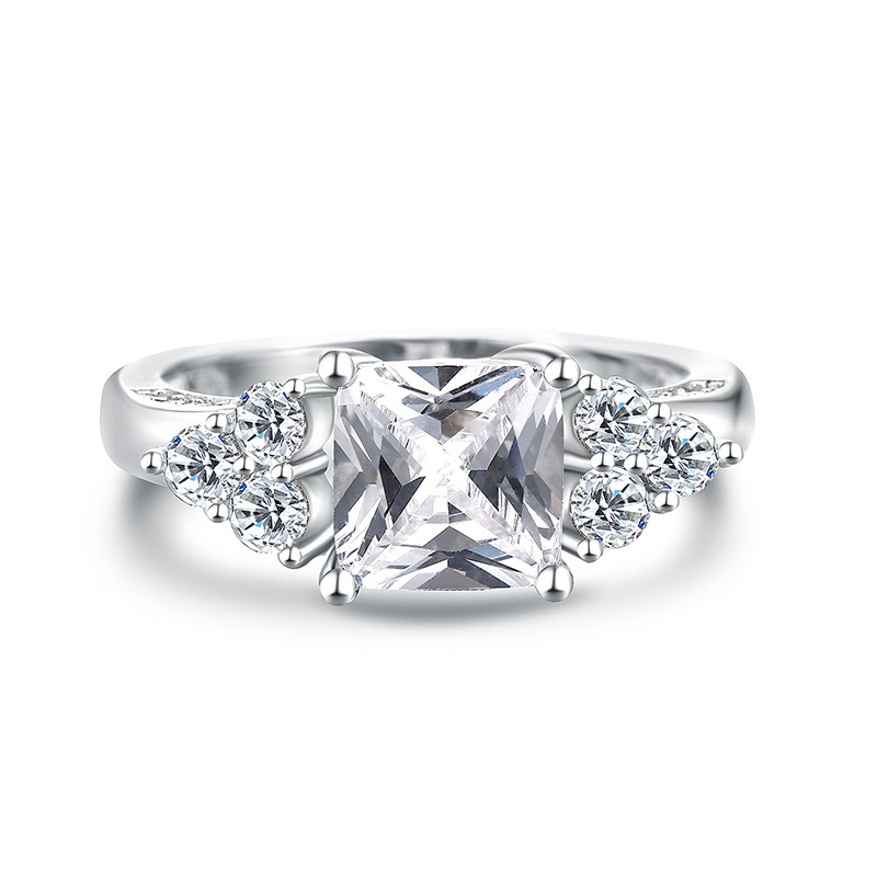 The crown silver ring from pure silver and inlaid with white crystal