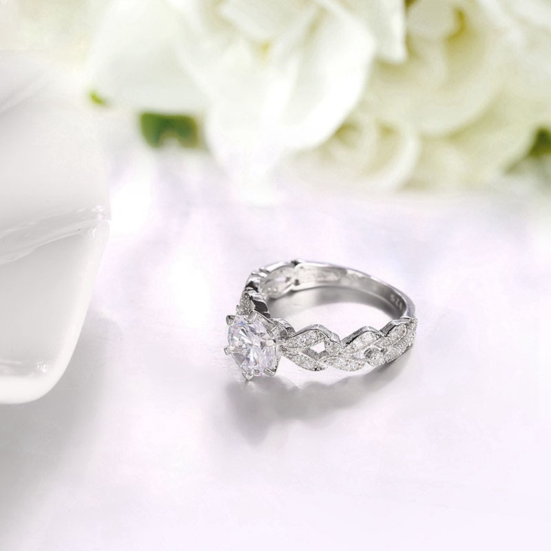 The three roses ring made from sterling silver inlaid with with white crystals