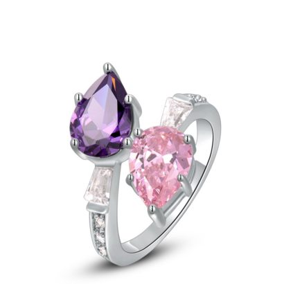 Special copper ring inlaid with white crystals and two big Violet and pink zircons