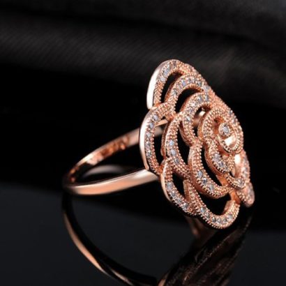 Copper ring plated with three layers of gold and inlaid with white zircons