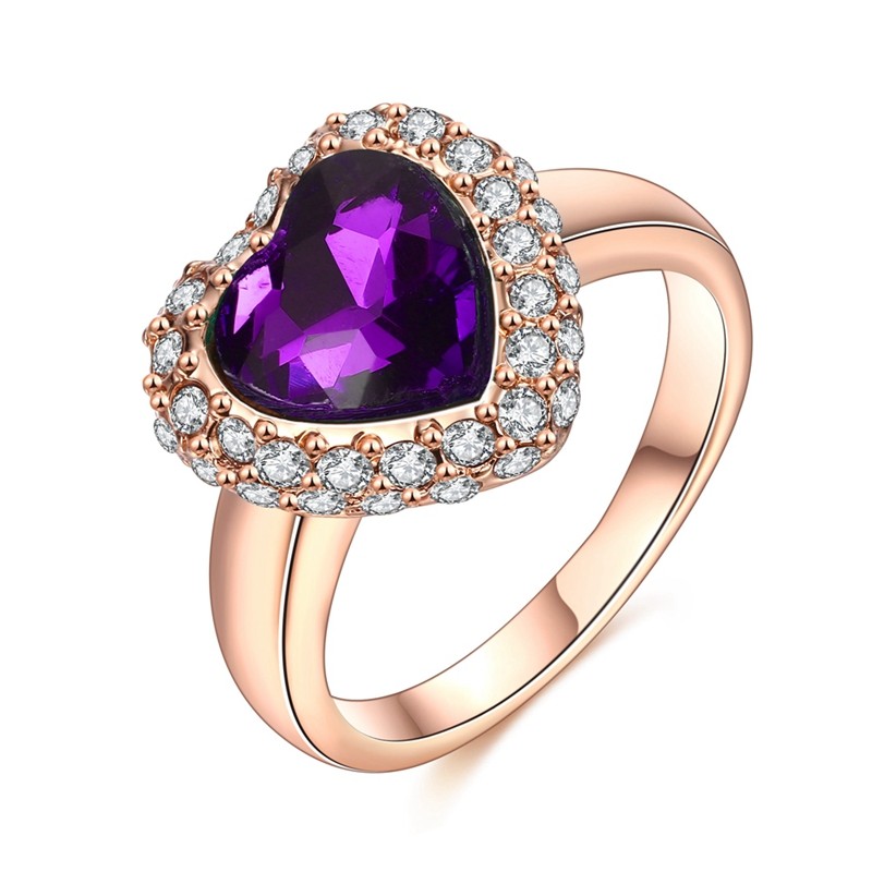 The violet heart ring three times gold plated and inlaid with white crystals an a violet zircon