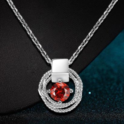 Braid necklace plated with platinum and has a red zircon in the middle