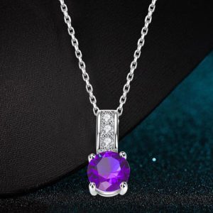 Necklace with unique design inlaid with a violet zircon