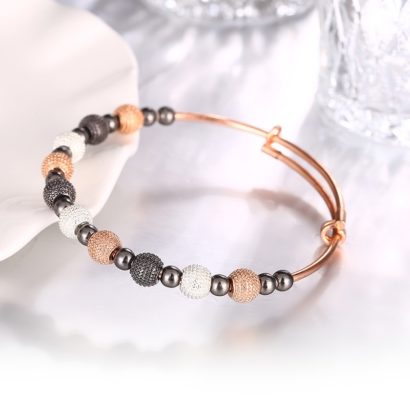 Rose gold plated bracelet has a unique design which allows it to be customized