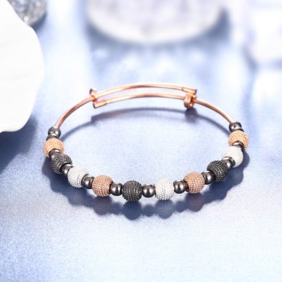 Rose gold plated bracelet has a unique design which allows it to be customized