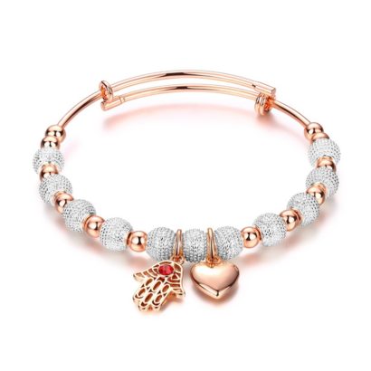 Heart and hand bracelet, gold plated, has a unique design which allows it to be customized