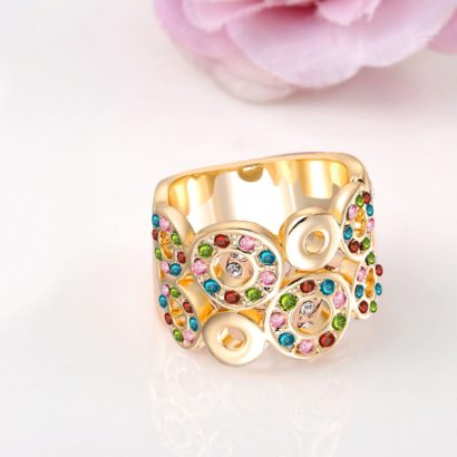 Unique design of gold plated 18K ring, decorated with circular shapes inlaid with colored zircon