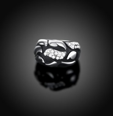 Water drop ring is a unique design plated with platinum and inlaid with diamond crystals and decorated by black oil drip