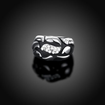 Water drop ring is a unique design plated with platinum and inlaid with diamond crystals and decorated by black oil drip