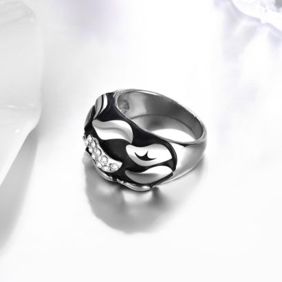 Water drop ring is a unique design plated with platinum and inlaid with diamond crystals and decorated by black oil drip