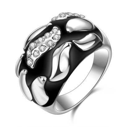 Water drop ring is a unique design plated with platinum and inlaid with diamond crystals and decorated by black oil drip