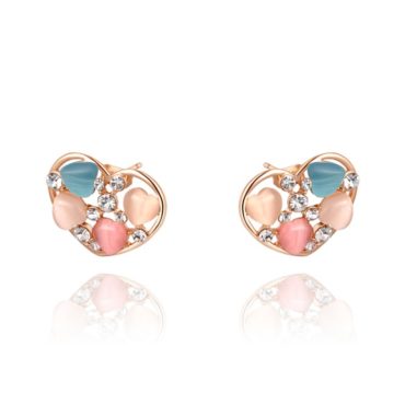 The heart earring is three times gold plated inlaid with white crystals and pied Austrian crystals