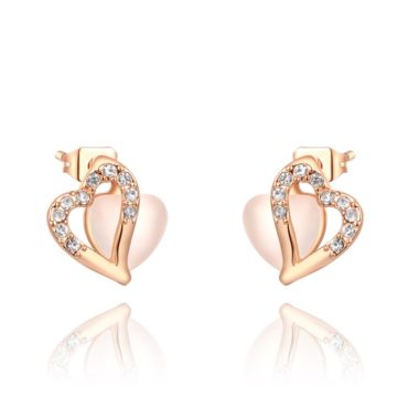 The heart earring is three times gold plated inlaid with white crystals and pied Austrian crystals