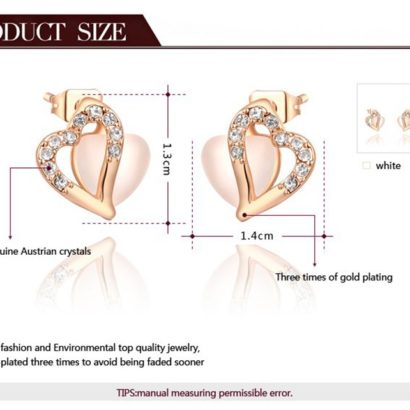 The heart earring is three times gold plated inlaid with white crystals and pied Austrian crystals