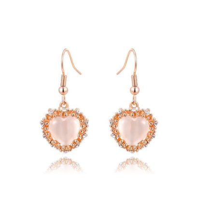 The pink Heart earring, three times gold plated and inlaid with pink opal surrounded by special crystals