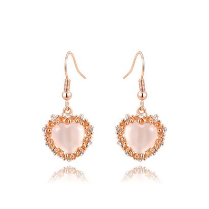 The pink Heart earring, three times gold plated and inlaid with pink opal surrounded by special crystals