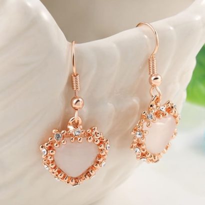 The pink Heart earring, three times gold plated and inlaid with pink opal surrounded by special crystals