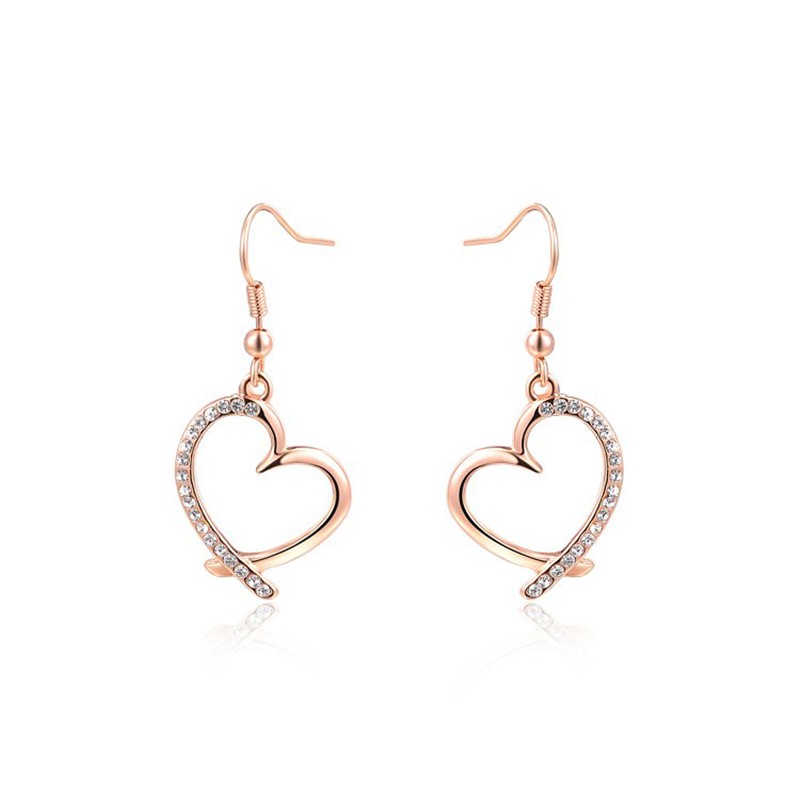The Heart earring, three times gold plated and inlaid with swiss crystals