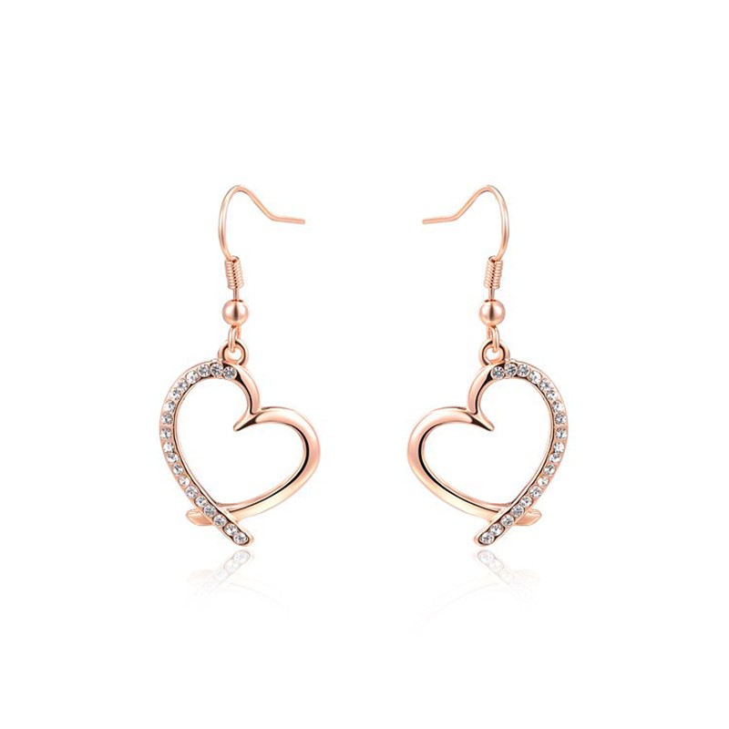 The Heart earring, three times gold plated and inlaid with swiss crystals