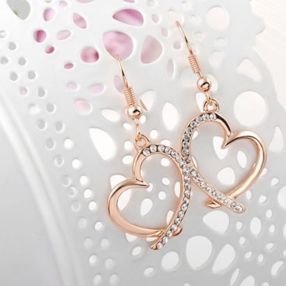 The Heart earring, three times gold plated and inlaid with swiss crystals