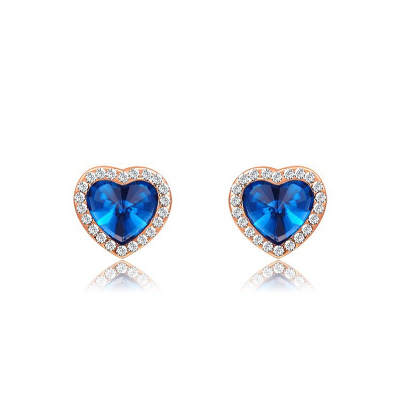 The Heart earring, three times gold plated and inlaid with swiss crystals and blue heart of zircon