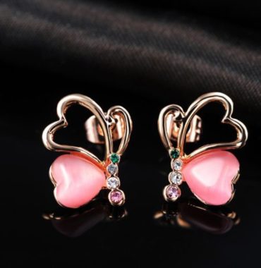 Love Hearts earring, has a unique design, three times gold plated and inlaid with pink pearl and colored crystals