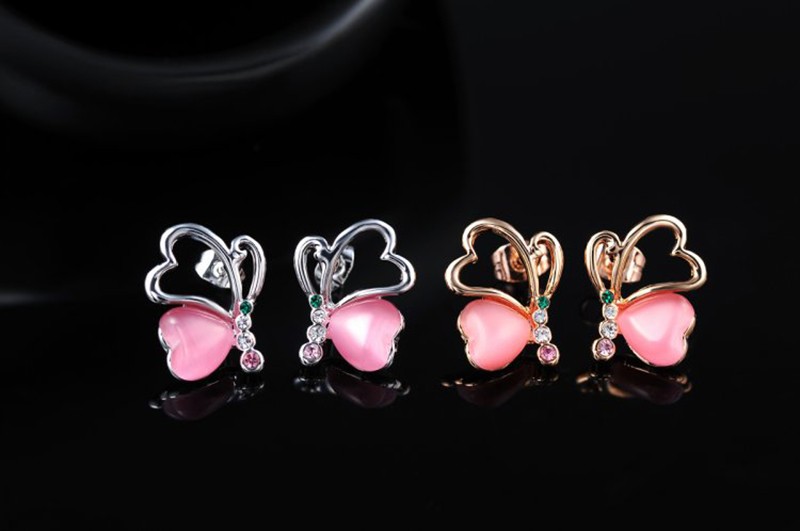 Love Hearts earring, has a unique design, three times gold plated and inlaid with pink pearl and colored crystals