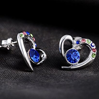 The heart earring is three times gold plated inlaid with colored crystals and blue Austrian crystals