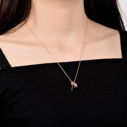 The lovers necklace has the heart key and the heart lock design made from rose gold