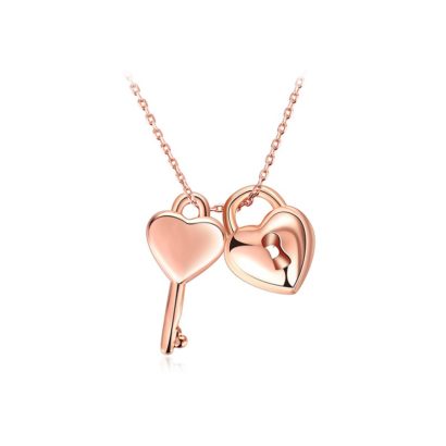 The lovers necklace has the heart key and the heart lock design made from rose gold