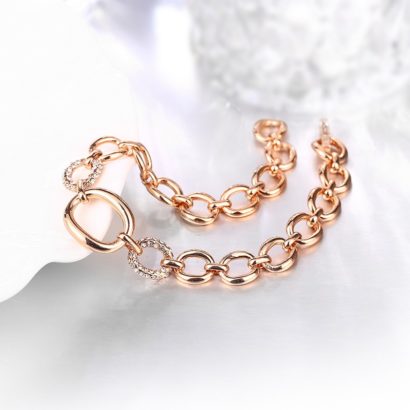 Chain bangle made from rose gold and inlaid with two diamonds